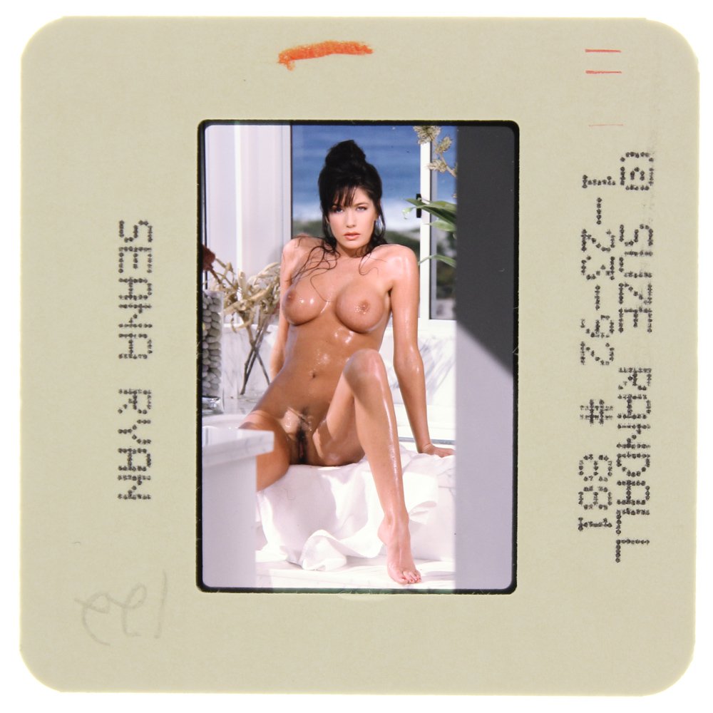 Seana Ryan 1992 35mm By Suze Randall: Original 35mm slide features Seana Ryan taken by Suze Randall in 1992. Print and/or markings on the slide mount are original. Mode