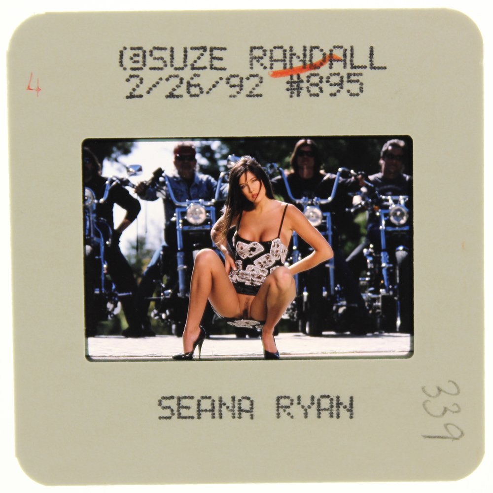 Seana Ryan 1992 35mm By Suze Randall: Original 35mm slide features Seana Ryan taken by Suze Randall in 1992. Print and/or markings on the slide mount are original. Mode