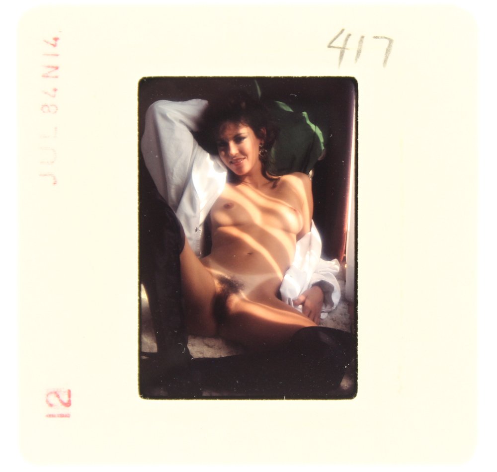 Nina Lee 1984 35mm By Bob Guccione: Original 35mm slide features "Nina Lee." It was taken by Bob Guccione in 1984. Print and/or markings on the slide mount are original.