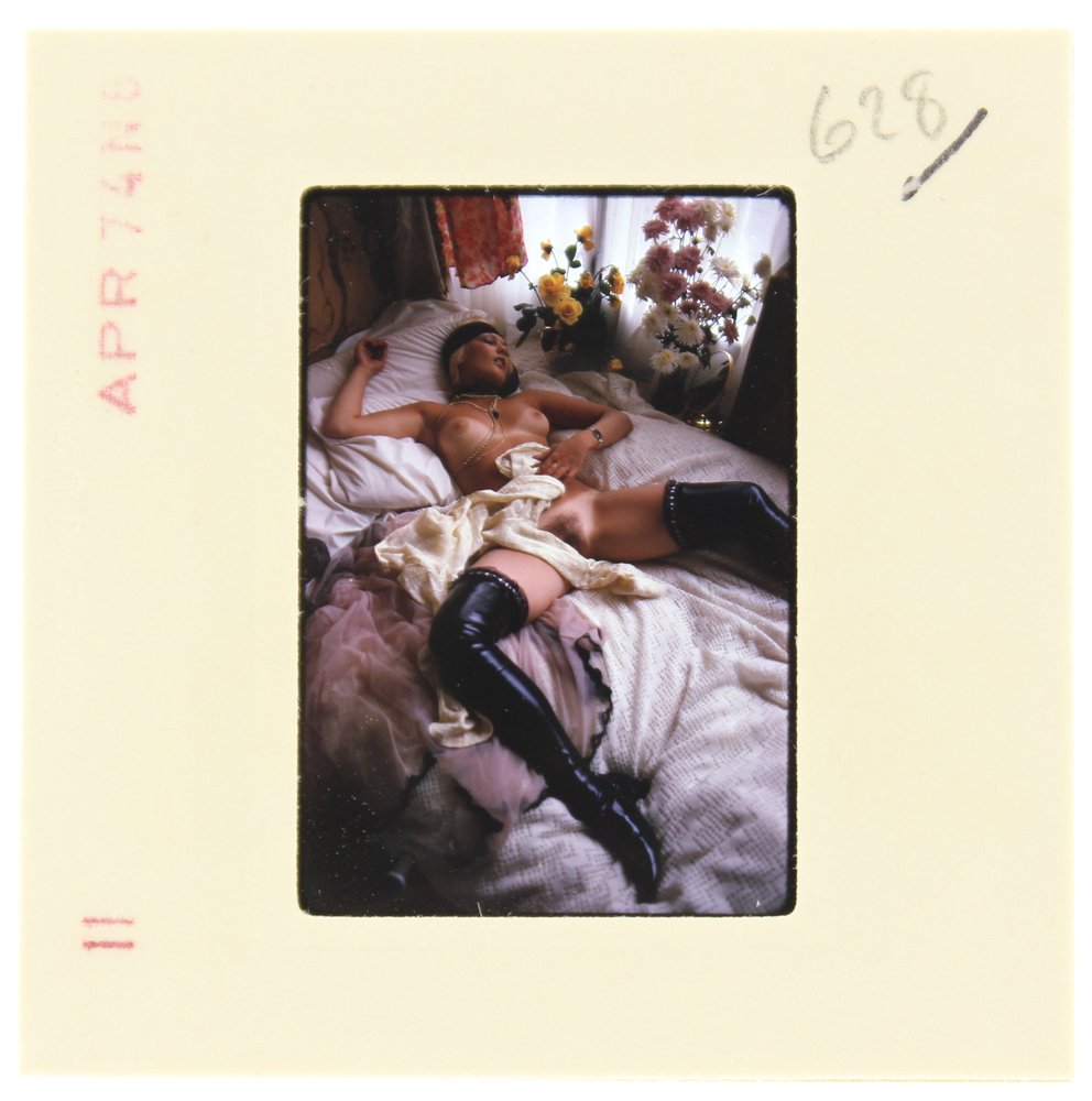 Janice Kane 1974 35mm By Bob Guccione: Original 35mm slide features Janice Kane taken by Bob Guccione in 1974. Print and/or markings on the slide mount are original. Mod