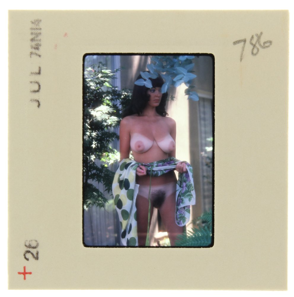 Avril Lund 1974 35mm By Bob Guccione: Original 35mm slide features Avril Lund taken by Bob Guccione in 1974. Print and/or markings on the slide mount are original. Mod