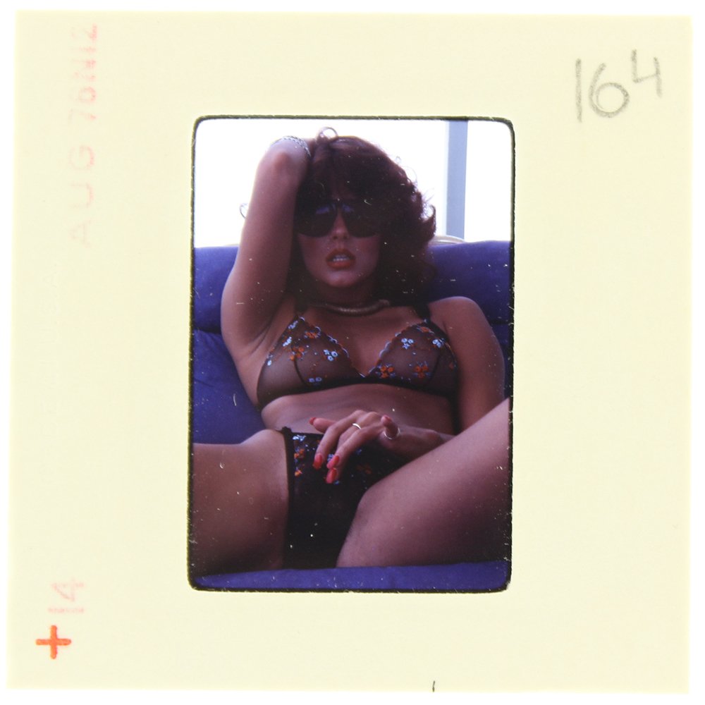 Laura Doone 1976 35mm By Bob Guccione: Original 35mm slide features Laura Doone taken by Bob Guccione in 1976.Subject: Laura Doone is our raven-tressed, t