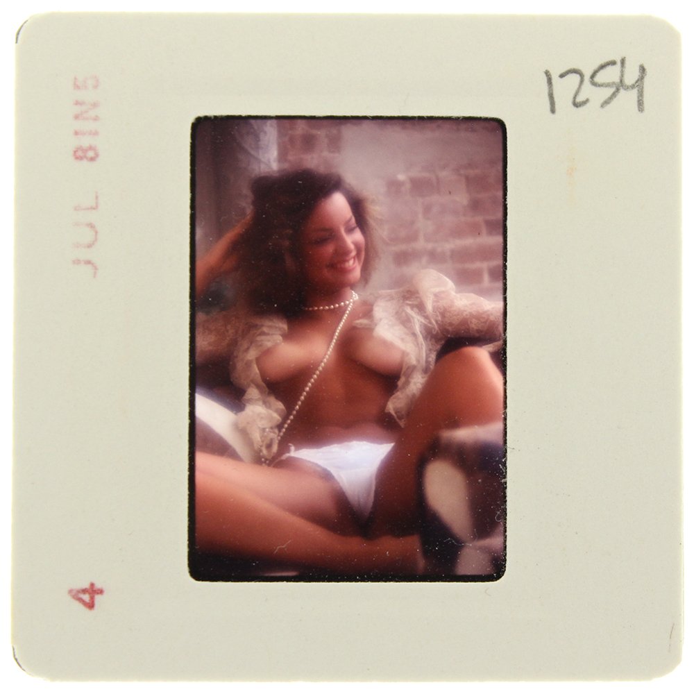 Sheila Kennedy 1983 35mm By Bob Guccione: Original 35mm slide features Sheila Kennedy taken by Bob Guccione in 1983. Subject: Penthouse Pet Sheila Kenned