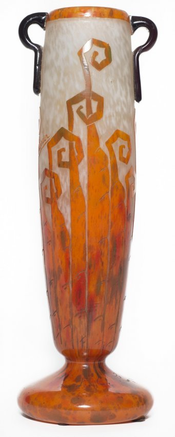 Charder Le Verre Francais Orange Fougare Vase: Charles Schneider used fern like decorations on at least three or four different vases of a similar design. The piece offered here is striking with lovely applied black glass handles. 15 inches tall.