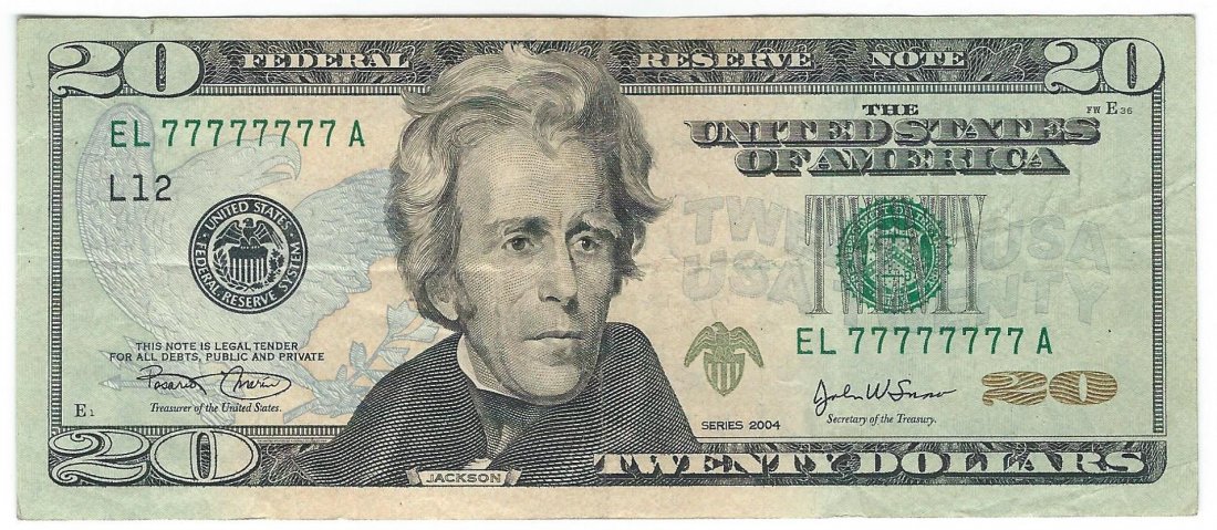 Fr. 2089-L - Solid Serial Number 2004 $20 FRN: We know that solid serial numbers get harder to find as the number gets higher. This is a lightly circulated solid 7s on a new style twenty. The back has a vertical teller stamp just waiting to be rem