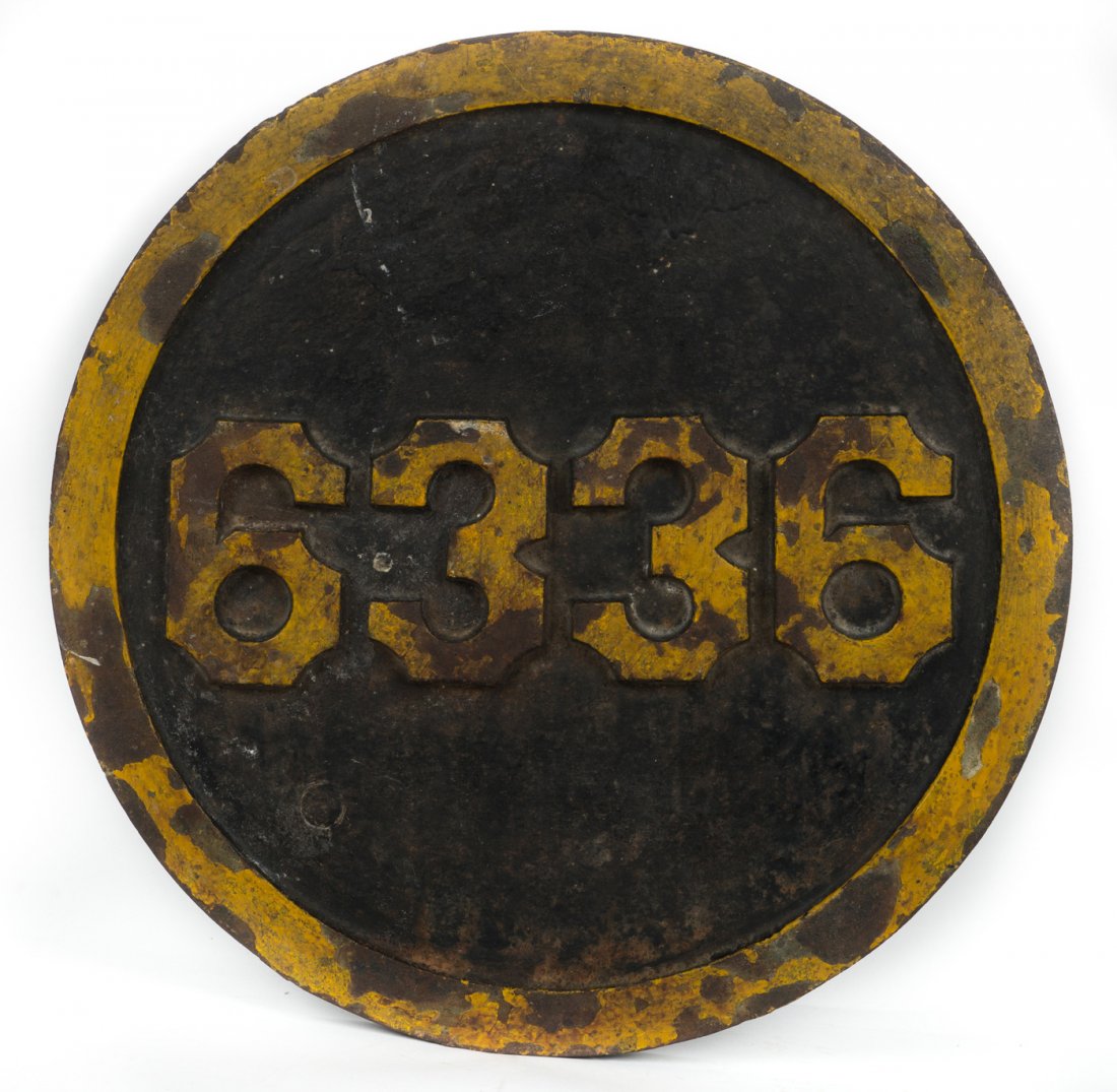 PRR Number Plate #6336 - 2-10-0 I1S: Round front end number plate of Pennsylvania Railroad Locomotive #6336, a 2-10-0 type I1s locomotive built at Juniata in 1919, rebuilt to I1sa in May 1941, and scrapped in Aug. 1956. This plate still 