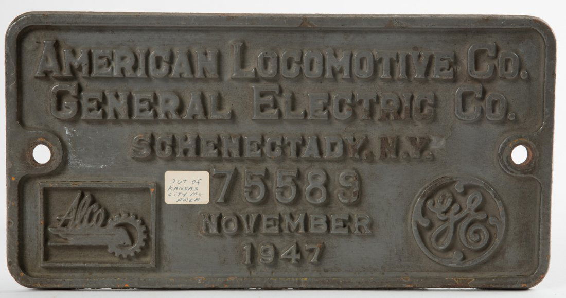 UP #16100 ALCO / GE Builder's Plate #75589: American Locomotive Company / General Electric Co. Schenectady, N.Y. Builder's Plate with Alco and GE Logos Serial #75589, dated November 1947. This plate has an old sticker that reads "Out Of Kansas