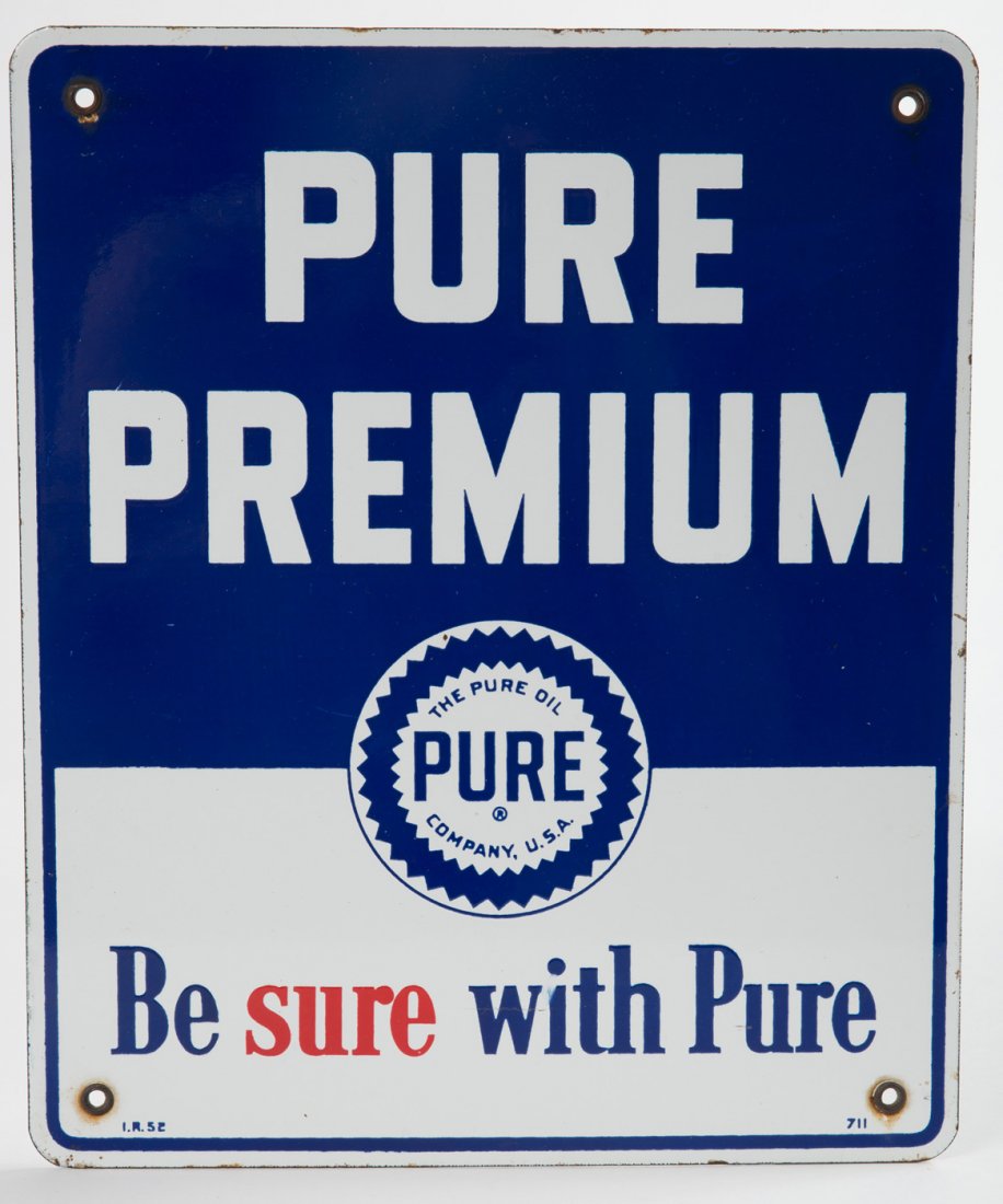 Pure Premium Porcelain Pump Plate: Porcelain Pump Plate for Pure Premium with Pure sawtooth logo and "Be Sure With Pure" tagline. Sign is marked "I.R. 52" in bottom left corner and "711" in bottom right corner. There is a bit of rust f