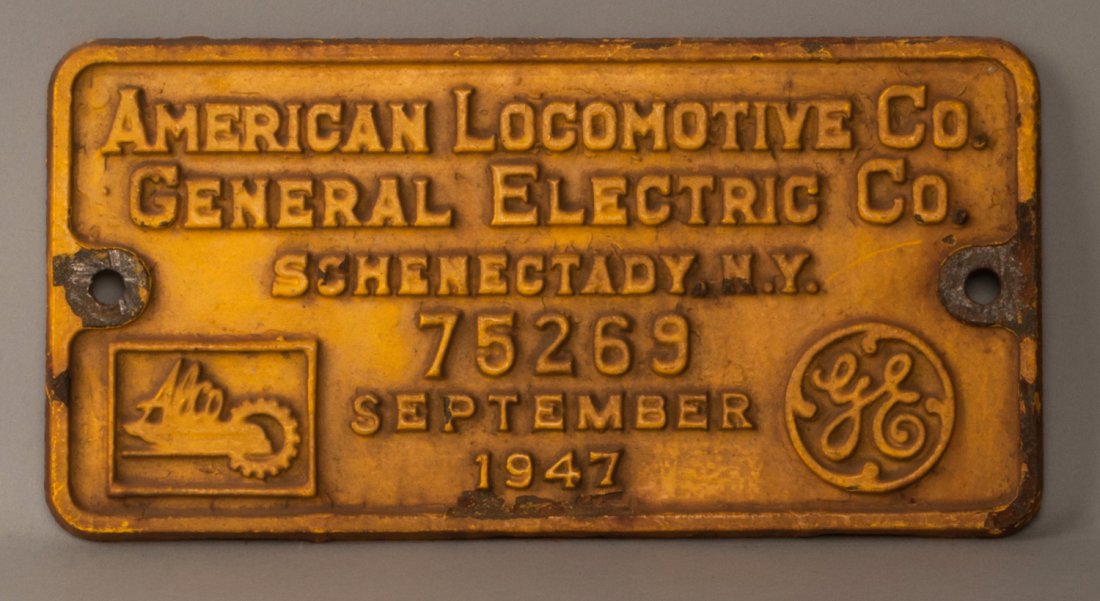 OIM 1102 - RS-2 Diesel Locomotive Builder's Plate: ALCO - Schenectady Diesel Locomotive Builder's Plate 75269 off of Oliver Iron Mining Railroad ( OIM ) Locomotive #1102 a RS-2. 12" x 6"