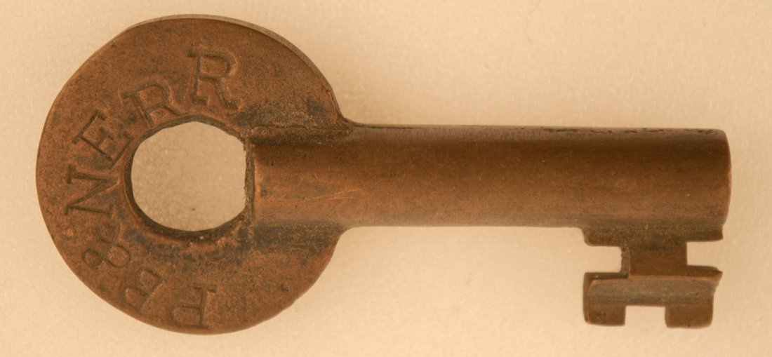 Philadelphia Bethlehem & New England Railroad Key: Brass switch key with serif letters PB&NERR. Marked on back SLAYMAKER and numbered 283.