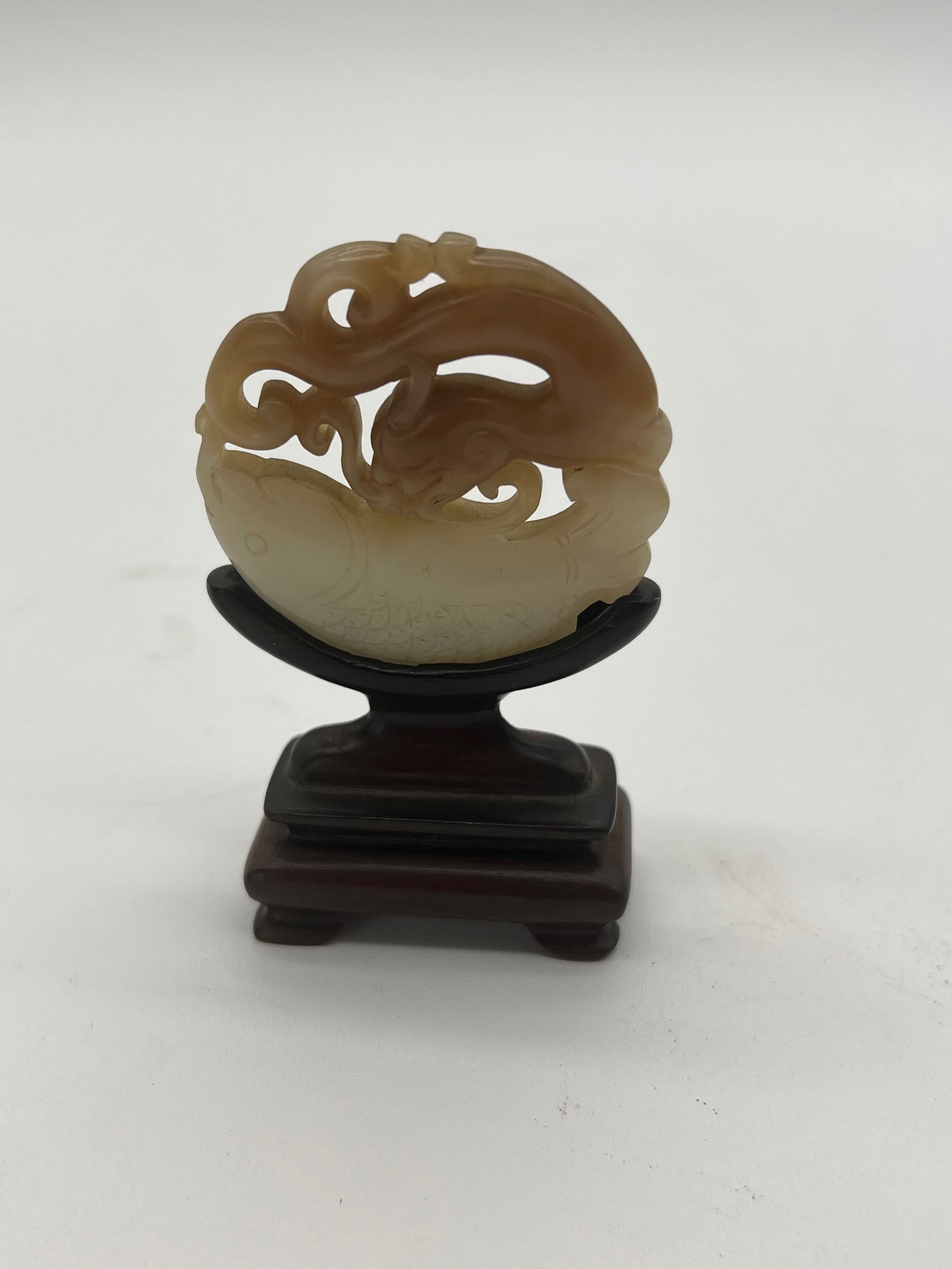 A Chinese two-tone Nephrite jade fish with stand (1 of 8)
