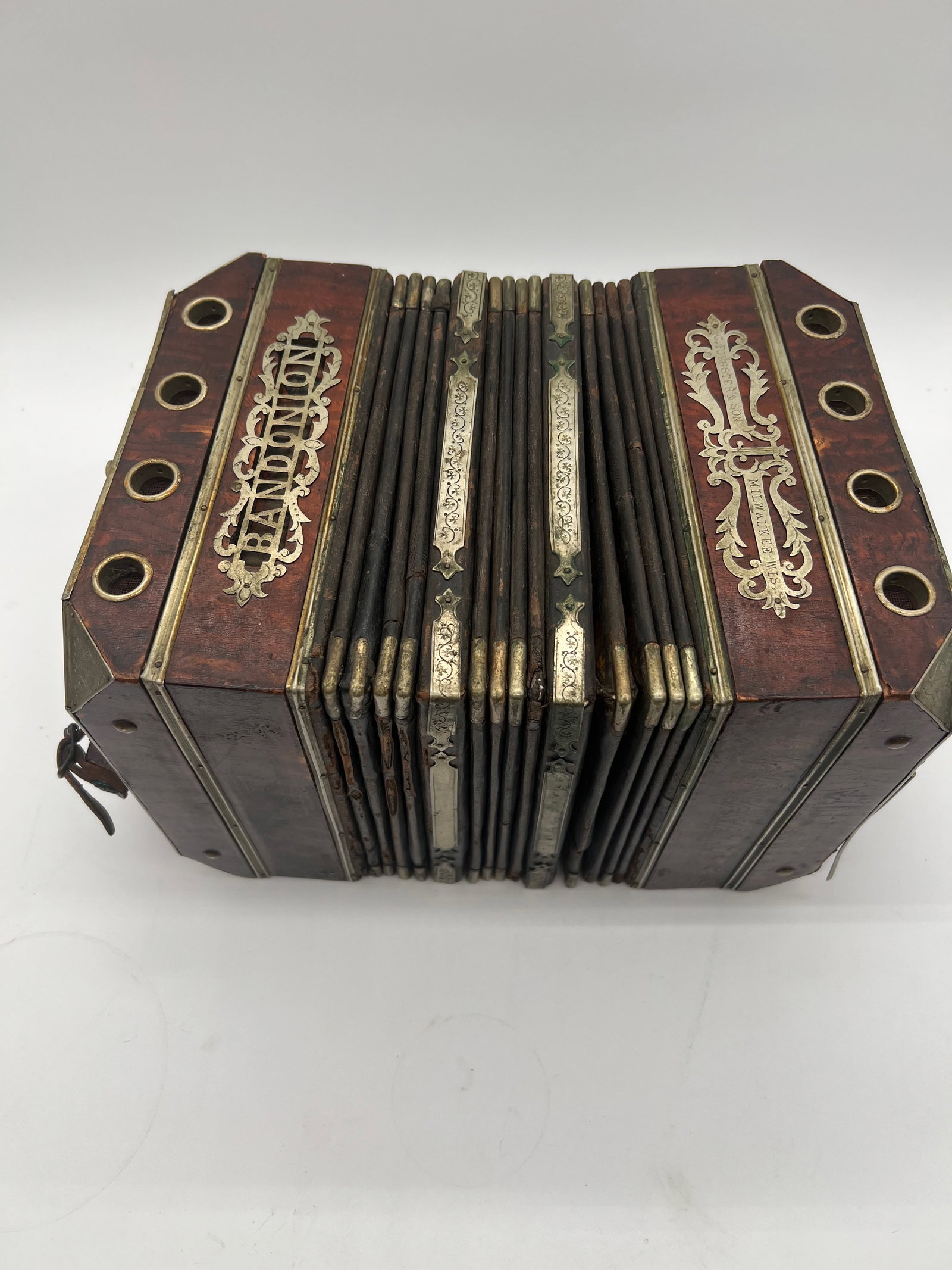 CARL FOERSTER & SONS MILWAUKEE WI BANDONION BANDONEON 1909 - 1920'S: A Bandonion made by Foerster & Son of Milwaukee, WIS.Carl Foerster & Sons was a Milwaukee maker of bandoneon's, concertina's, accordians, reed orgams, and roller organs. It was founded by German immig