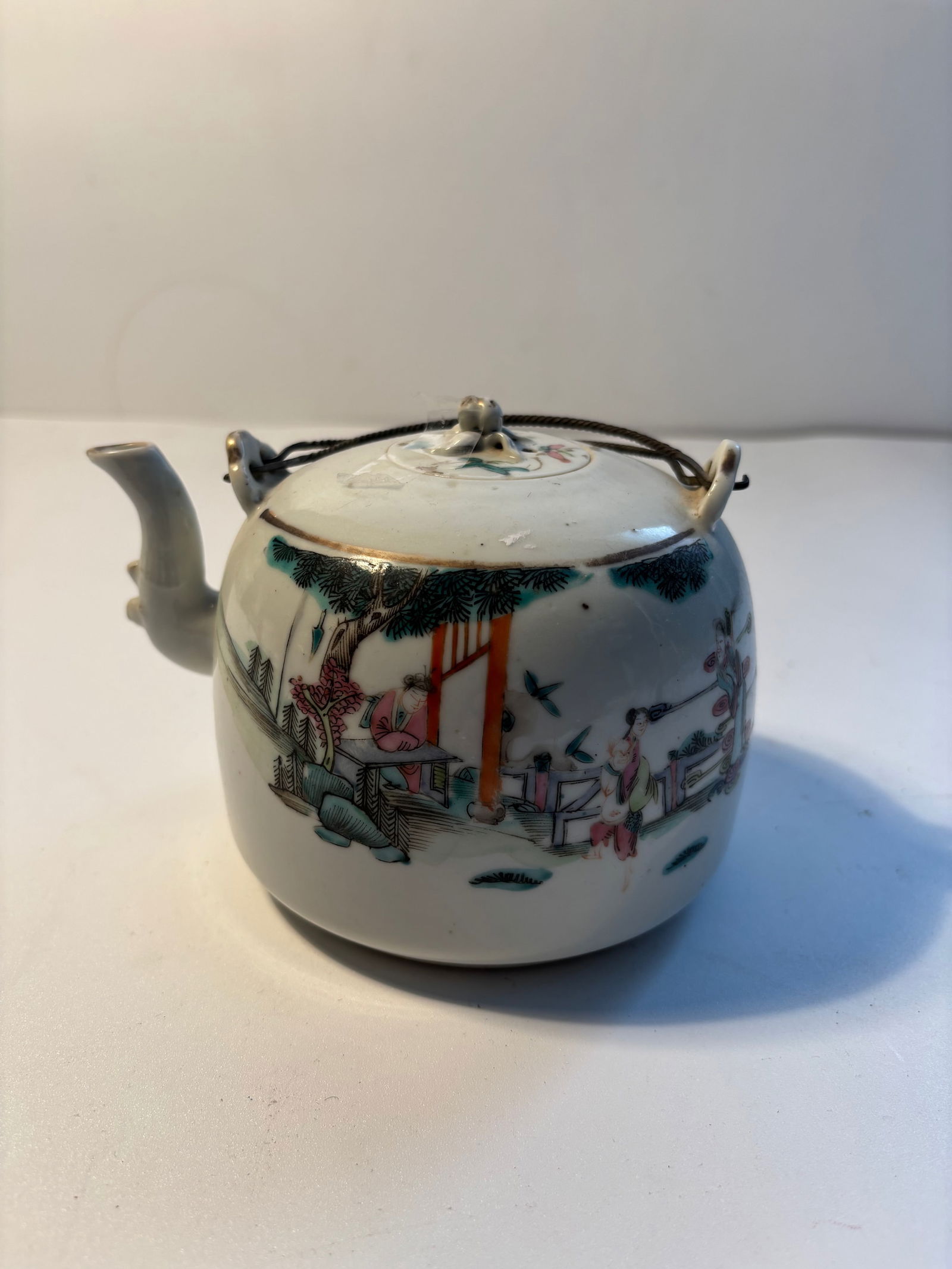 A Chinese famille rose porcelain teapot with iron-red mark (1 of 14)