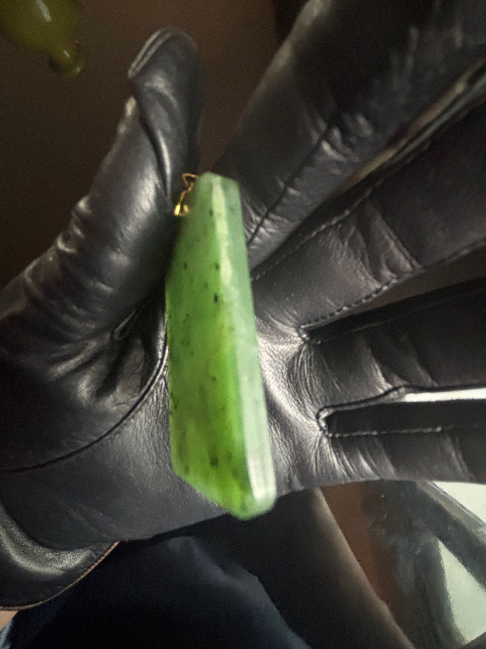 A Chinese green nephrite jade pendant (1 of 5)
