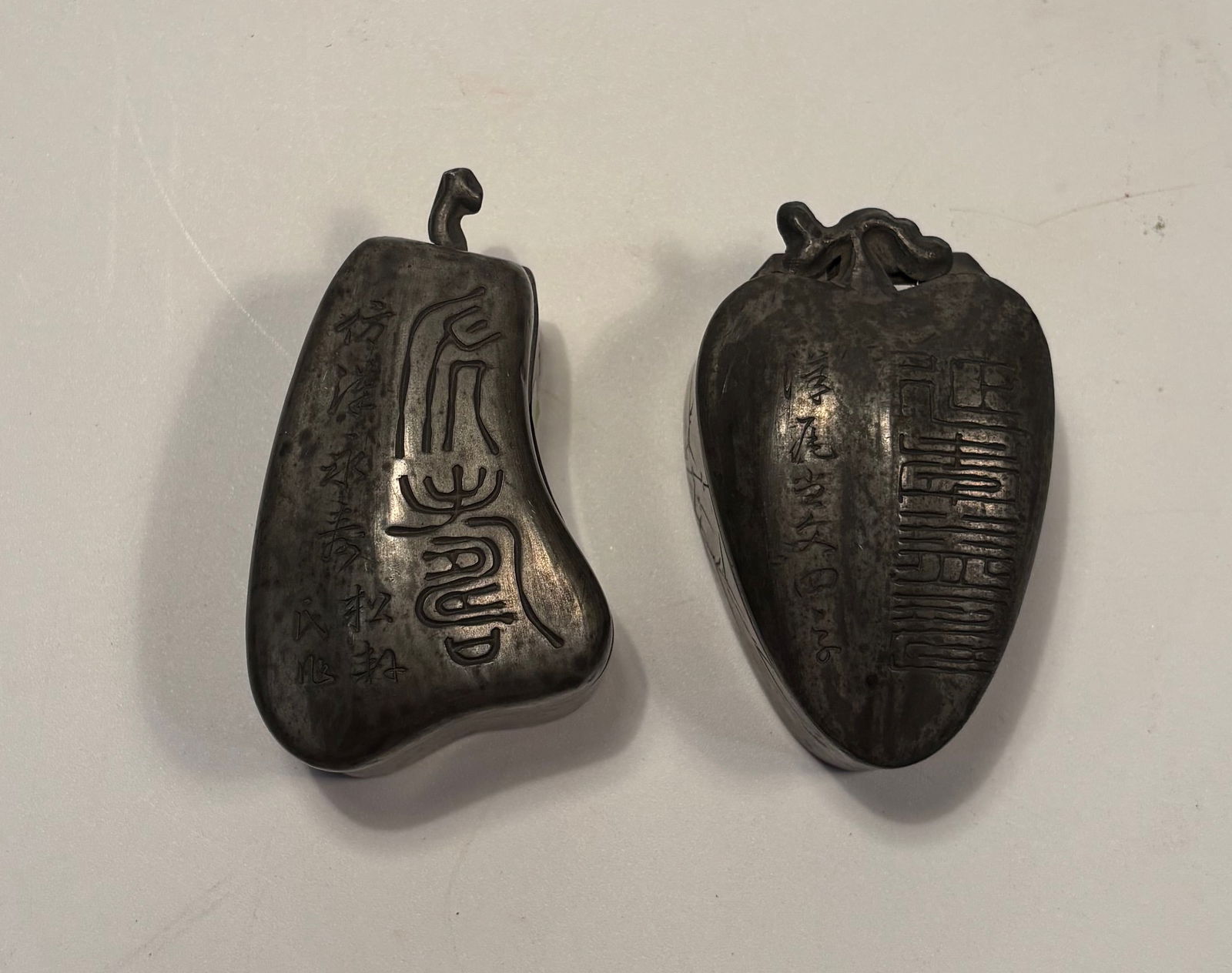 A set of two engraved Chinese calligraphy pewter boxes with mirror inside (1 of 16)