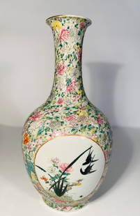 A Chinese famille rose porcelain vase with "JU REN TANG" mark: Ju Ren Tang Marks: Porcelain with this mark is often linked to the Daoguang Emperor’s reign (1821–1850) The vase features two decorative panels (cartouches) with a contrasting white background.One