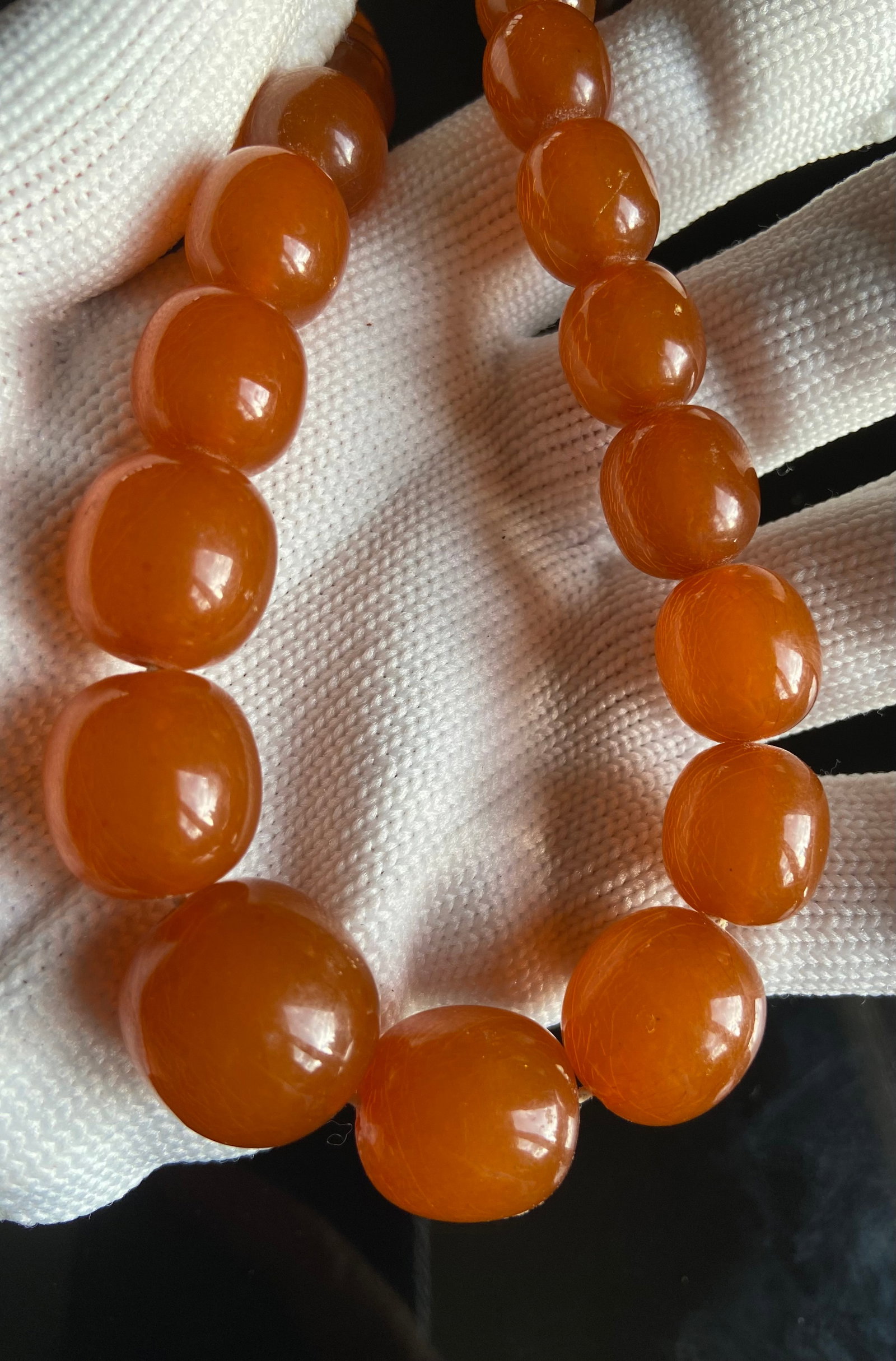 Real Honey amber graduate beads necklace: Length: 28 inches largest beads length: 30mm ; Total Weight: 66 g