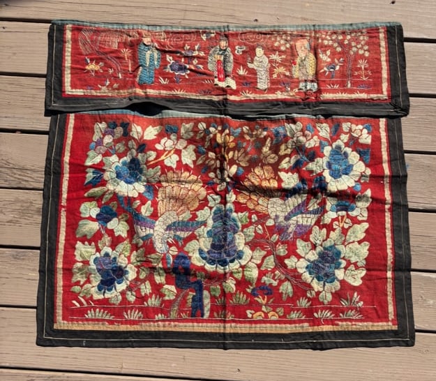 A Chinese embroidered panel: Qing Dynasty (1644-1912) ;Rich floral motif featuring large peonies and lotuses, plus stylized phoenix or bird forms, and also five human figures, all densely embroidered. Length:31 inches ; Width: 37