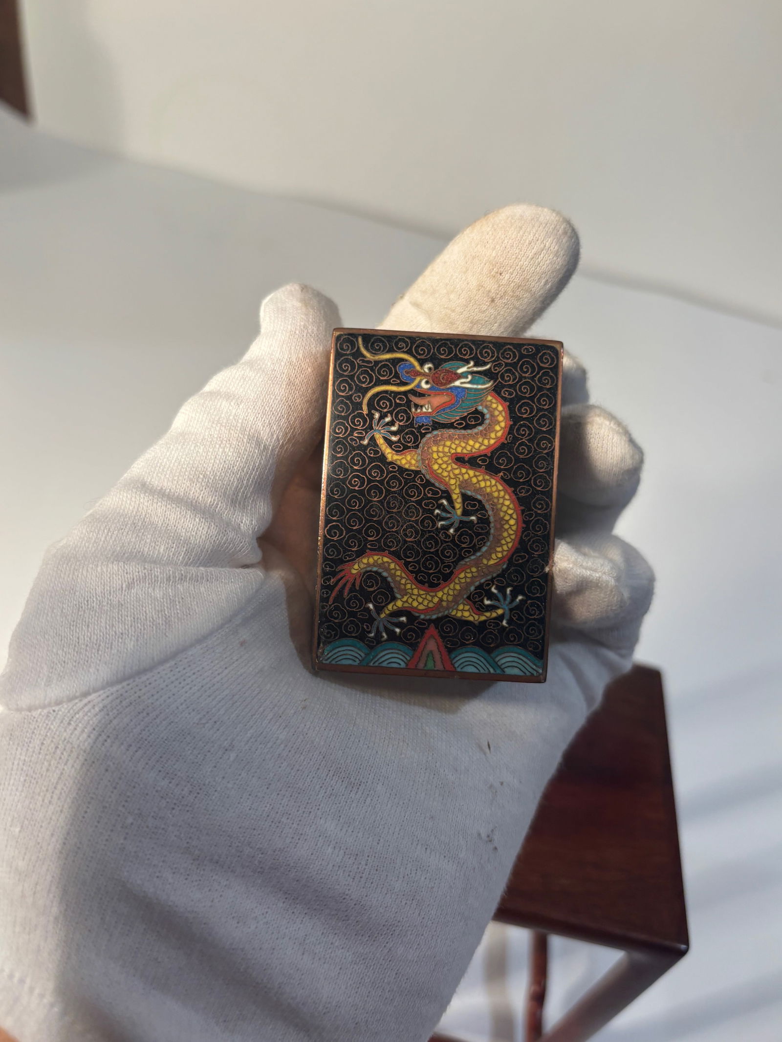 A Chinese dragon cloisonné enamel matchbox holder: Qing Dynasty (1644-1912); Length: 2 1/4 inches