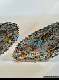 A Chinese famille rose porcelain scalloped shape platter: Qing Dynasty (1644-1912), It features a traditional Chinese garden scence of several people , which might represnet a legendary tales or historical scenes. Length: 11.25inches ; Width: 8.5inches ; Hei