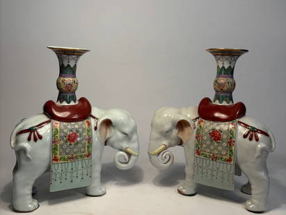 Pair of Chinese Famille Rose Porcelain Elephant-Form Joss Stick Holders: Late 19th century -early 20th century, A finely painted pair of Chinese Famille Rose porcelain joss stick holders modeled in the form of caparisoned elephants, dating to the Republic Period (early 20t