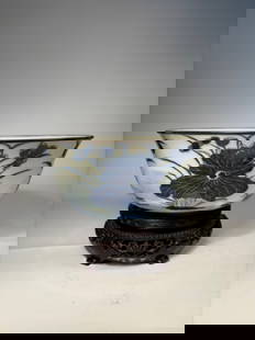 A Chinese Blue and White Porcelain Bowl with"zheng ruo shen cang"  mark: kangxi period(1661-1722); Mounted with a Bronze Rim; A finely painted Chinese porcelain bowl featuring underglaze cobalt blue lotus blossoms and scrolling tendrils against a white ground. The floral d