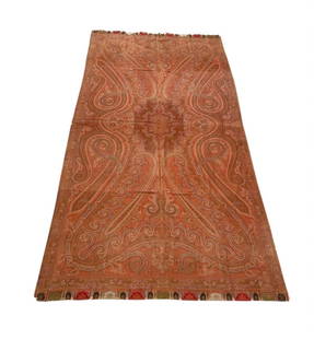 A Kashmiri Wool Paisley Shawl: Mid-19th Century;featuring a highly detailed boteh (paisley) design in shades of red, pink, ochre, green, and ivory. The central medallion radiates outward with elaborate scrolling motifs, floral acce