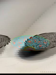 A Chinese Cloisonné Enamel Bowl: Qing Dynasty(1644-1912); A Chinese Cloisonné Enamel Bowl with Plum Blossom and Longevity Symbol ; Of shallow, flaring form, the interior richly decorated with blossoming plum branches against a brigh