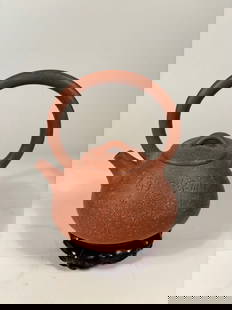 A Chinese Yixing Zisha Teapot with Calligraphy “Mansheng"  and  Stamped "Peng Nian": LATE 19TH TO EARLY 20TH CENTURY; A finely crafted Chinese Yixing Zisha teapot, made in the manner of the celebrated Qing dynasty potter Yang Pengnian. The teapot is of compressed globular form with a