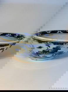 A large Chinese blue and white porcelain bowl: Qing dynasty (1644-1912), Diameter: 11 inches ; Height: 4 inches