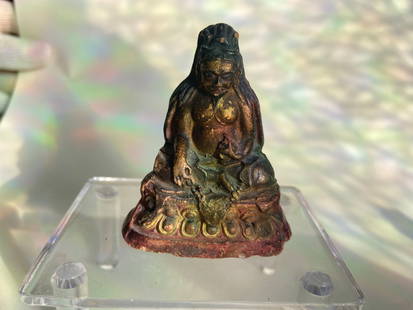Tibetan Gilt terracotta  Tsa-Tsa Figure of Female Deity, Stamped Base: 19th century , A Tibetan gilt terracotta tsa-tsa figure depicting a seated female deity, possibly Green Tara or Vajrayogini, shown in a traditional meditative pose. The figure is molded from clay, the