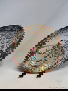 A Chinese Famille Rose Porcelain Plate with Figures,: Qianlong Period (1736–1795); A finely painted Chinese famille rose porcelain plate, dating to the Qianlong period (1736–1795). The central reserve depicts an elegant court scene with a noble lady
