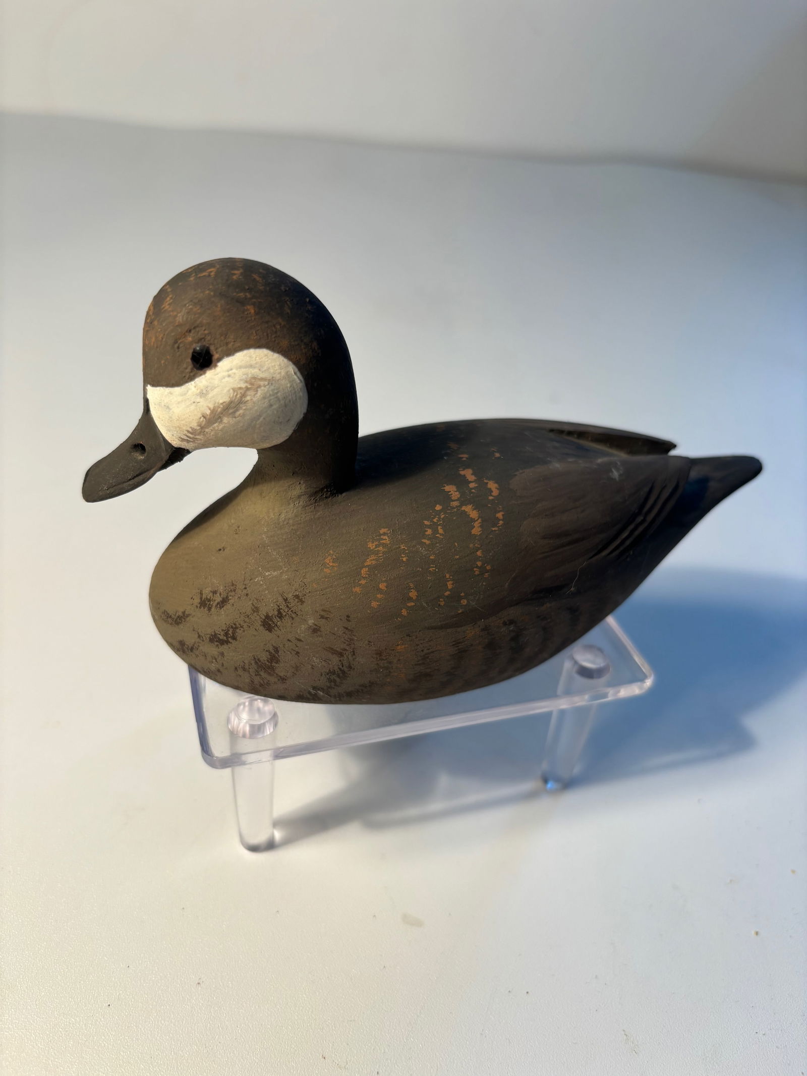 Tom Hunter carved wooden"Buffle-Head" female decoy signed: A vintage hand-carved wooden "Ruddy Duck" female, created by Tom Hunter of Flesherton, Ontario, Canada. The artist’s signature and the bird’s description are prominently marked on the bottom. Tom