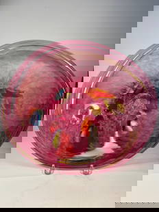 A large Signed S. Zlydic Art Glass Charger: A unique signed art glass bowl by S. Zlydic? featuring a vivid pink base with layered multicolored inclusions resembling feathers or petals. The wide, shallow form is hand-blown and raised on a circul