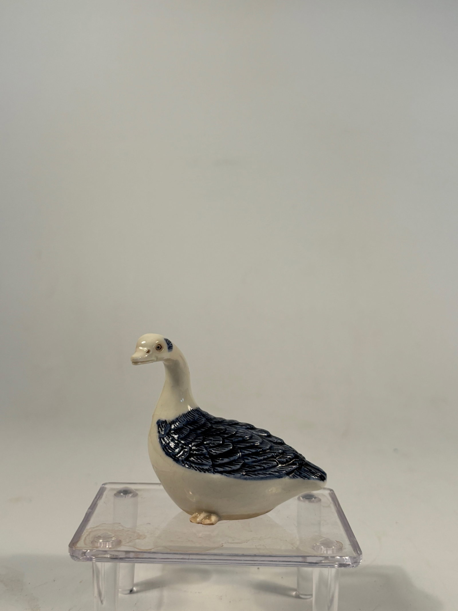 Japanese Hirado Porcelain Model of a Goose, Meiji Period: Meiji Period(1868-1912); Finely modeled and crisply detailed porcelain goose, naturalistically rendered in white glaze with delicate hand-painted accents. Characteristic of the high-quality craftsmans