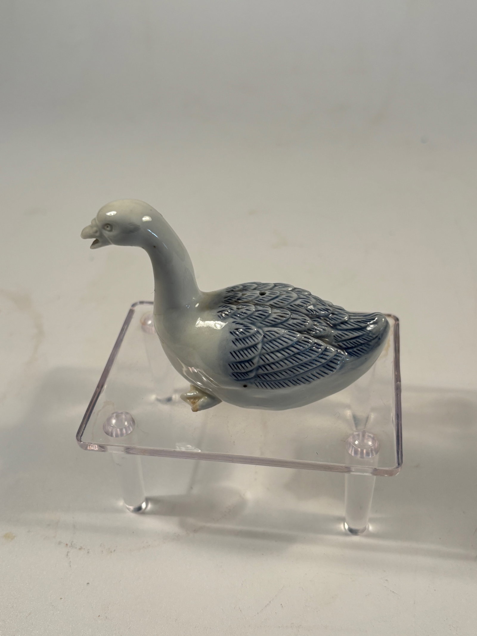Japanese Hirado Porcelain Model of a Goose, Meiji Period: Meiji Period(1868-1912); Finely modeled and crisply detailed porcelain goose, naturalistically rendered in white glaze with delicate hand-painted accents. Characteristic of the high-quality craftsmans