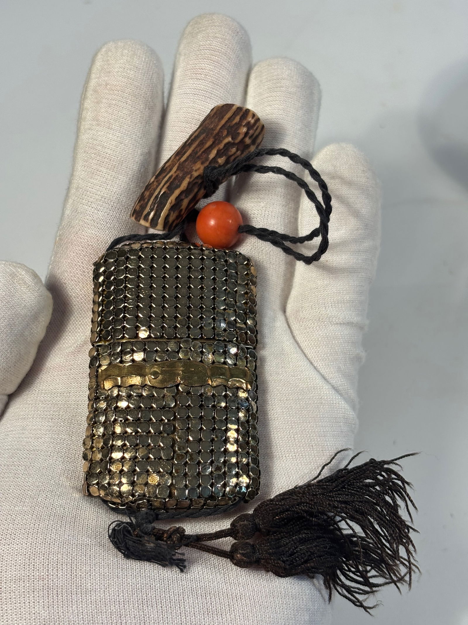 A Japanese Meiji Period Gilt Metal Mesh Inro Case with Coral Ojime and (Antler)? Toggle/Netsuke (1 of 10)