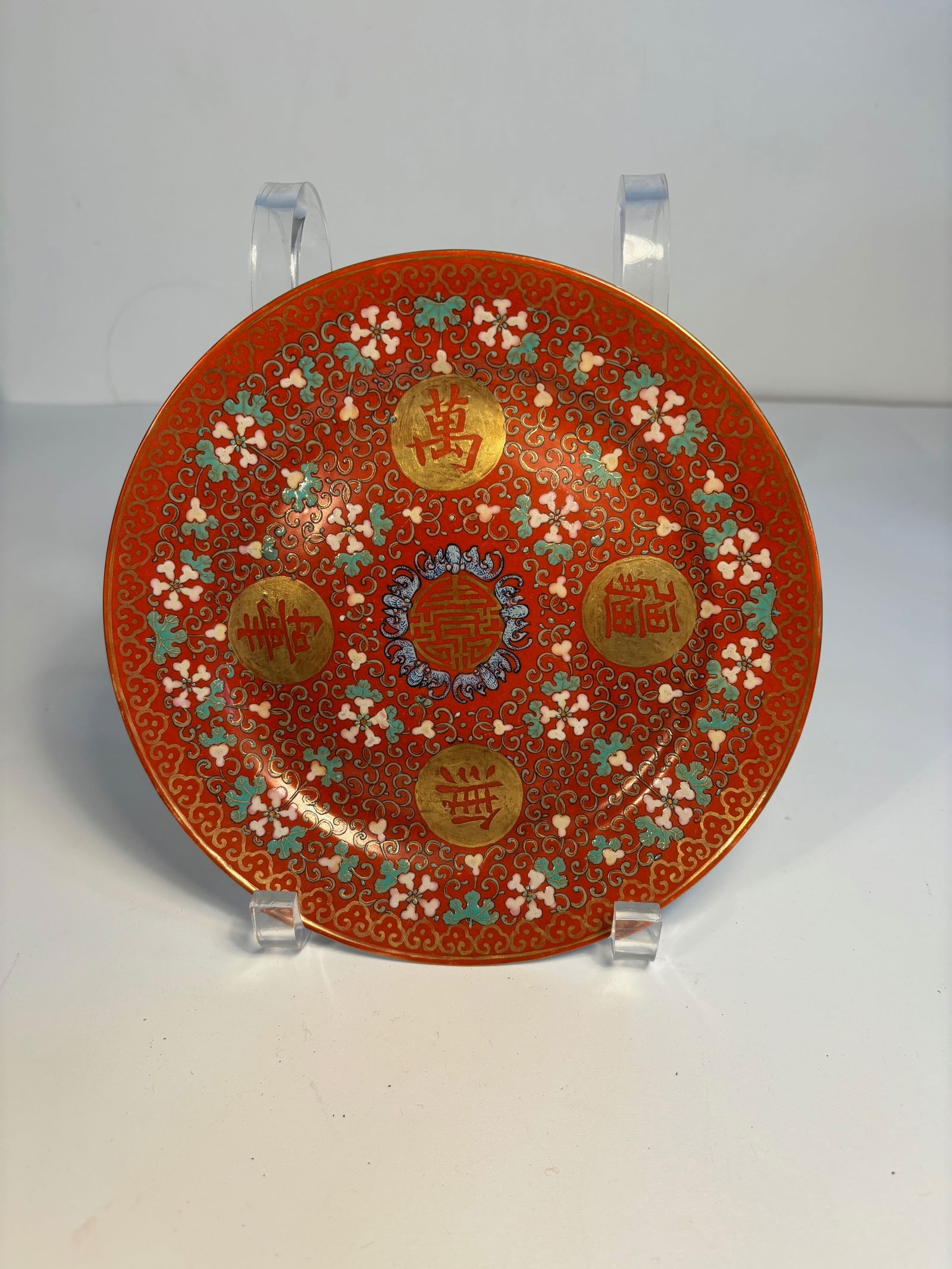 A fine and rare coral-ground gilt-decorated porcelain plate, Seal marks and period of QIANLONG (1 of 10)