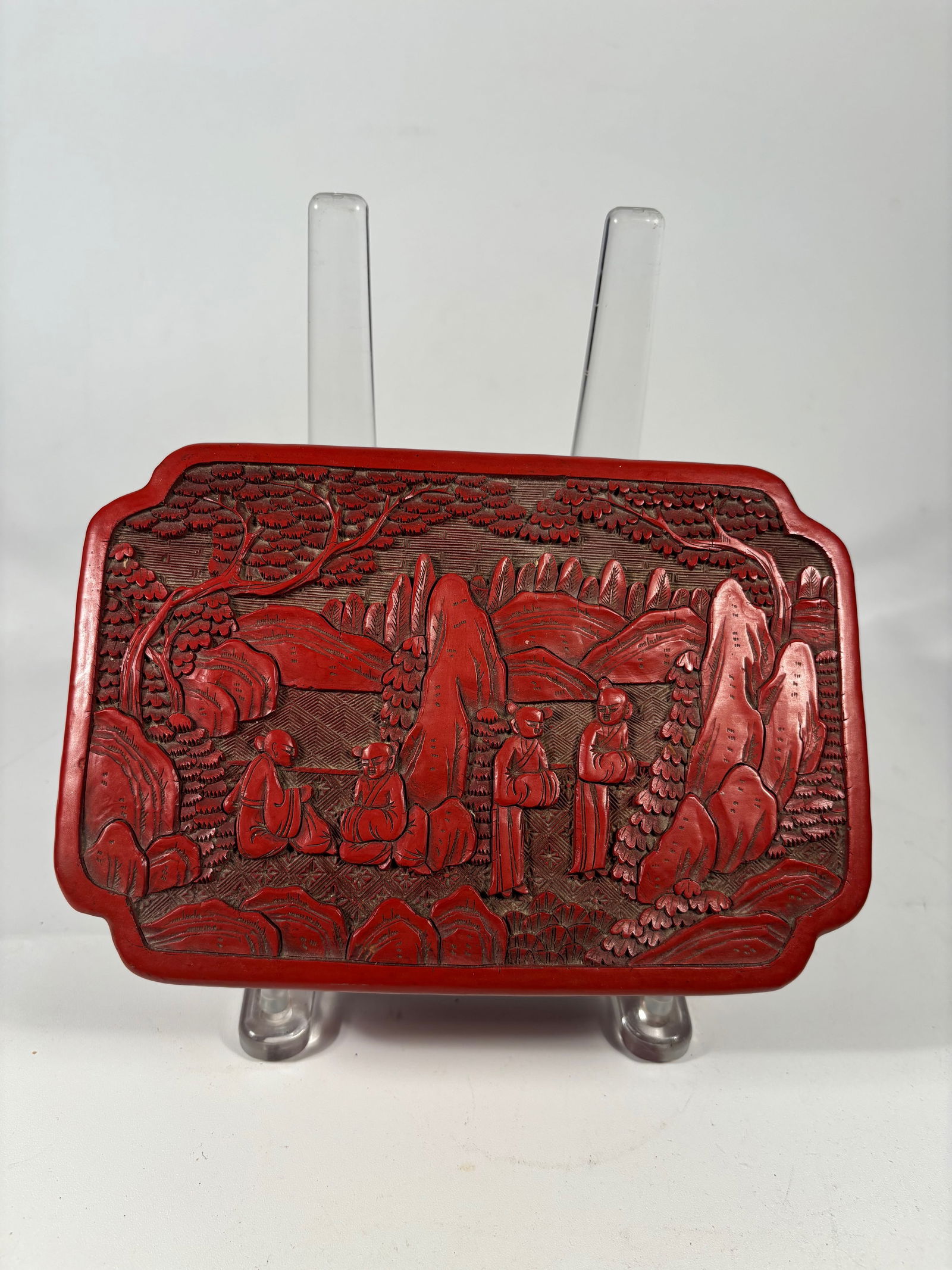 A Chinese Carved Cinnabar Lacquer Box with Scholars in Landscape, Marked “CHINA (1 of 8)
