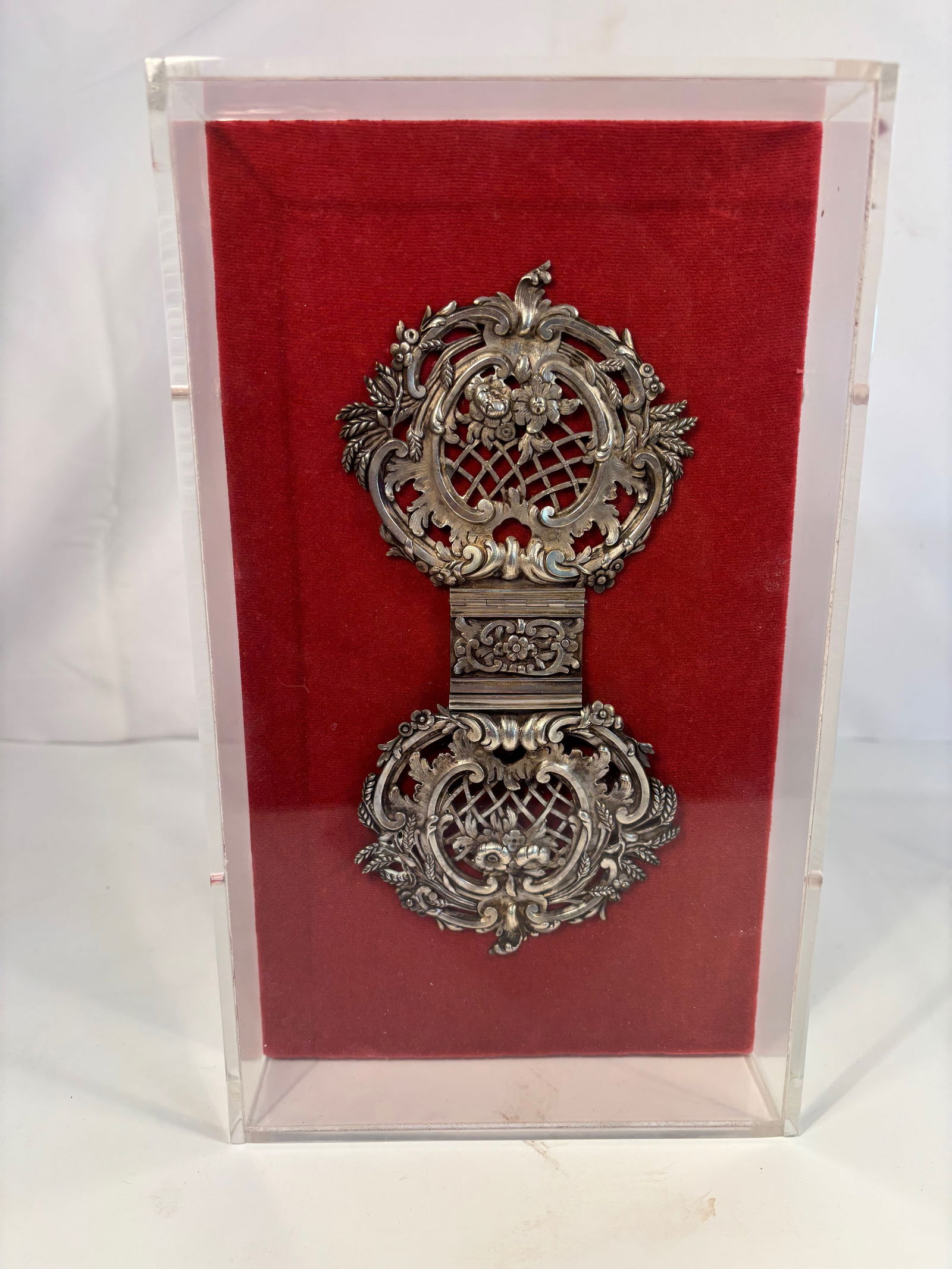 A Elaborate Rococo Revival Silver Belt Buckle or Clasp, 19th Century: Likely mid- to late-19th century, European (possibly French or Austrian).; An intricately cast and chased silver (or silver-plated) double-panel belt buckle featuring openwork scrolls, floral