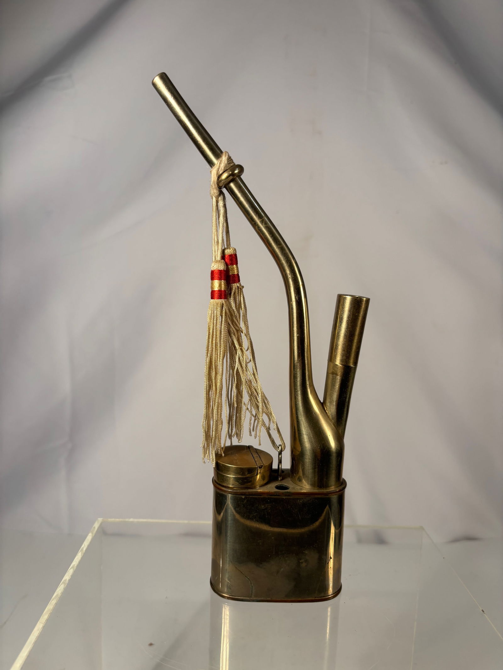 A Chinese White Brass (Baitong) Portable Smoking pipe set stamped GUANGDONG: Qing Dynasty, Guangxu Period (circa 1875–1908); A Qing dynasty white-brass (baitong) portable smoking set, dating to the Guangxu period (1875–1908). The set is composed of a tall, curved pipe stem