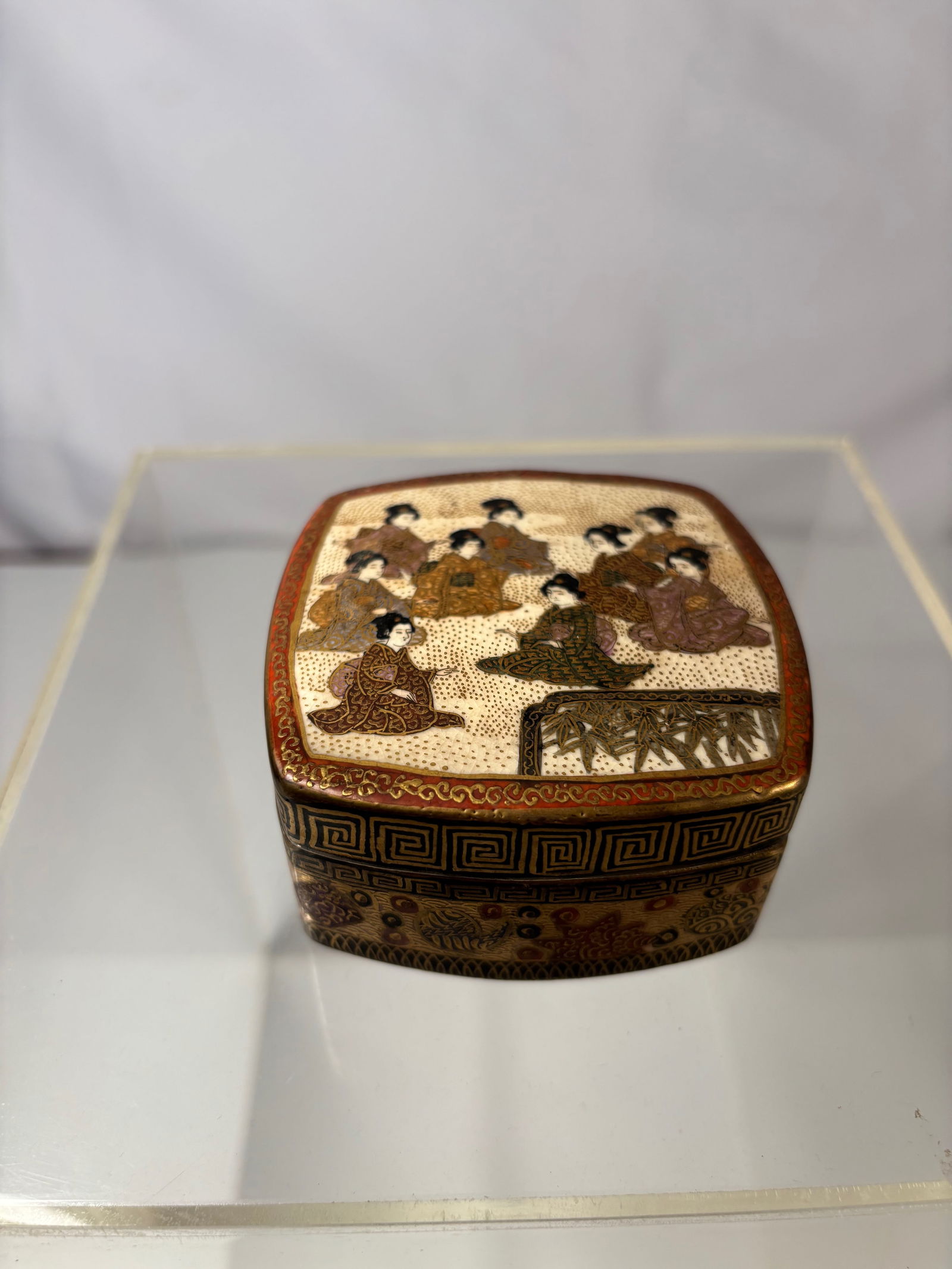 A Satsuma Koro, Signed Hododa, Meiji Period (1868-1912): Meiji period (1868–1912); The lid is decorated with a finely detailed group of court ladies (bijin) in elaborate kimonos, executed in the typical Satsuma millefleur (fine dot) and gold overglaze