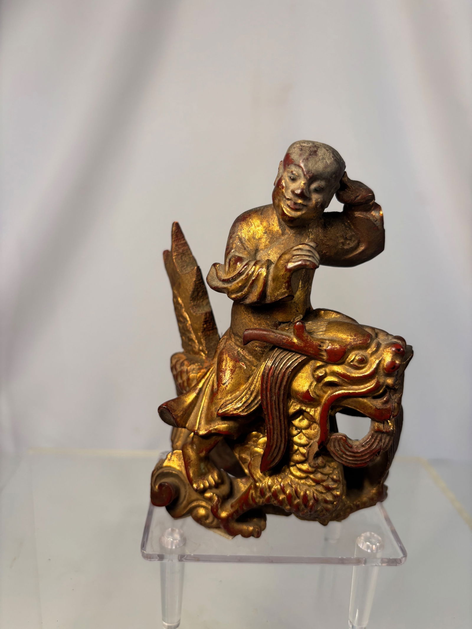 A Chinese Giltwood Figure of a Boy Riding a Dragon, Late Qing Dynasty (1 of 7)