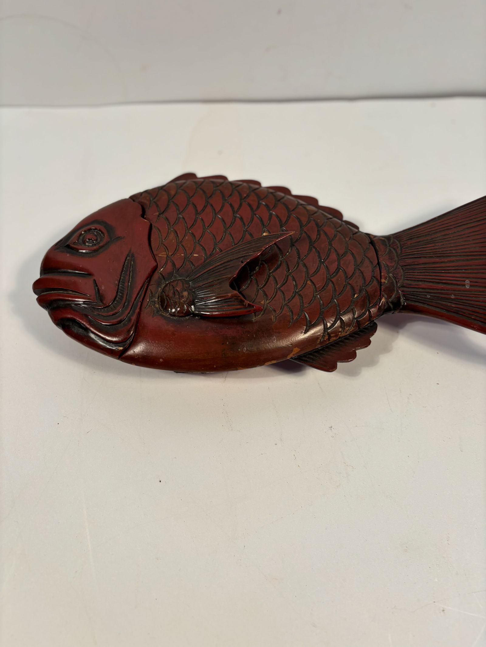 A Zohiko Kamakura Bori Japanese carved lacquer fish box: 19th century; Dimensions?16 Inches L X 8 W X 4H.