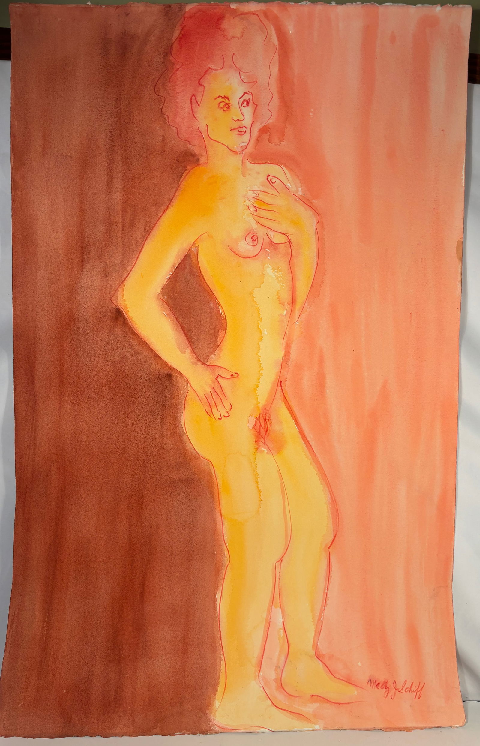 Molly J. Schiff (1927–2018), Standing Female Nude (Figure Study), mid 20th century: Watercolor and ink figure study on paper depicting a standing female nude against a warm, abstract ground. The figure is outlined with fluid red line and modeled with translucent washes of yellow, ora