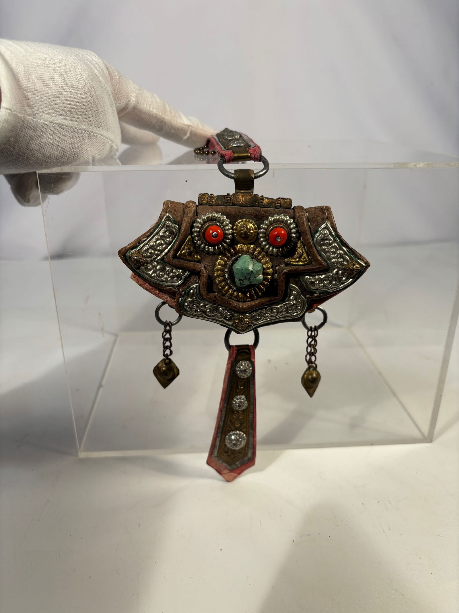 A Tibetan Leather Gau Amulet with gilted Brass Studs and Pendant Drops, 19th century (1 of 14)