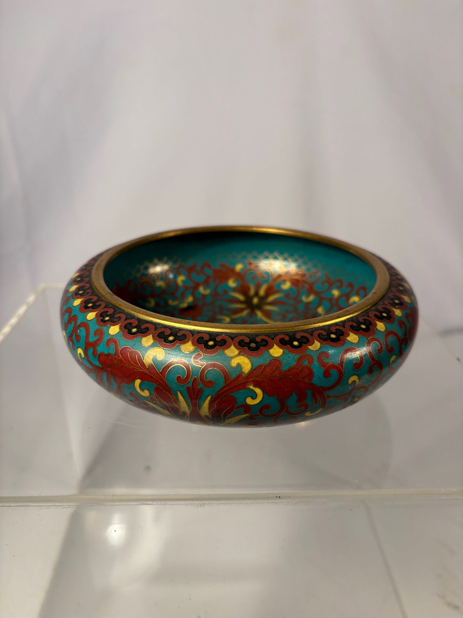 Chinese Cloisonné Enamel Brush Washer with Turquoise Interior, 19th Century: Finely crafted Chinese cloisonné enamel brush washer, dating to the late Qing Dynasty (19th century). The compressed circular form is decorated with scrolling polychrome lotus motifs in rich turquois