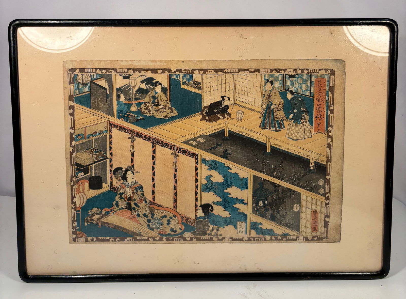 Utagawa Kunisada (Toyokuni III, 1786–1865) – Interior Scene with Courtesans, Edo Period: Japanese woodblock print depicting an elegant interior with courtesans and attendants, richly detailed in late-Edo bijin-ga style. Signed and framed under glass, with label on reverse identifying Toyo