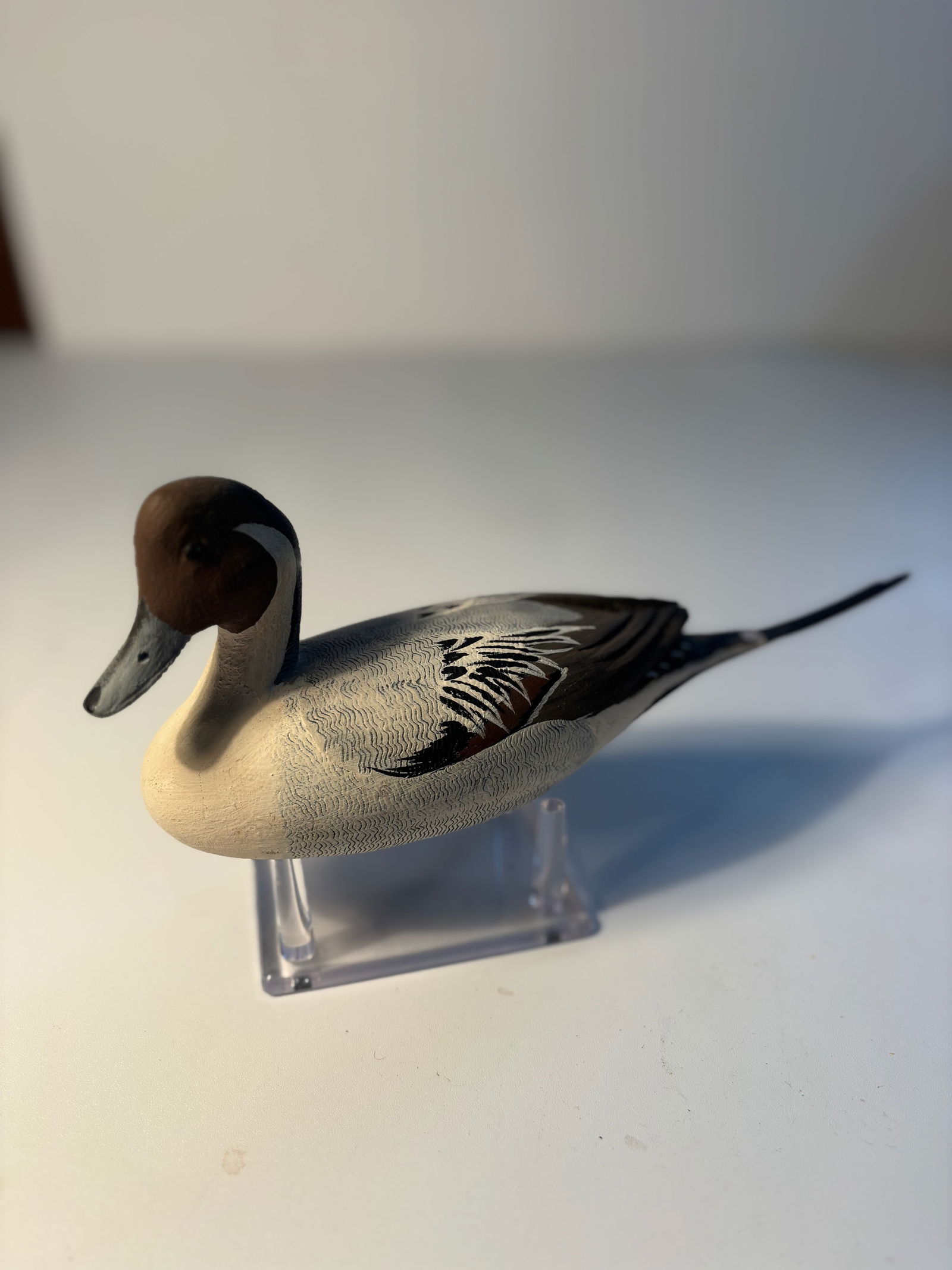 Tom Hunter carved wooden "Pintail" male decoy signed: A vintage hand-carved wooden "Pintail" male, created by Tom Hunter of Flesherton, Ontario, Canada. The artist’s signature and the bird’s description are prominently marked on the bottom. Tom Hunte