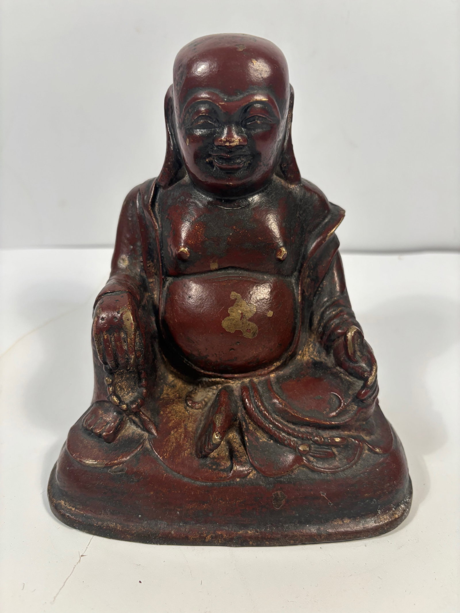 A Chinese gilted and red lacquered bronze Happy buddha Statue (1 of 10)